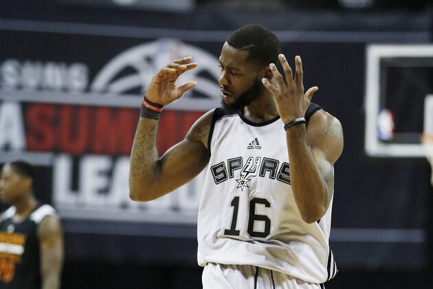 San Antonio Spurs’ Jonathan Simmons reacts after a play against the Phoenix Suns during the first half of an NBA summer league basketball game Monday, July 20, 2015, in Las Vegas. (AP Photo/John Locher) San Antonio Spurs’ Jonathan Simmons reacts after a play against the Phoenix Suns during the first half of an NBA summer league basketball game Monday, July 20, 2015, in Las Vegas. (AP Photo/John Locher)