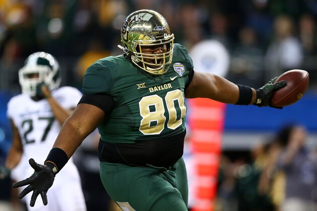 ARLINGTON, TX - JANUARY 01: LaQuan McGowan #80 of the Baylor Bears runs for a touchdown against the Michigan State Spartans during the second half of the Goodyear Cotton Bowl Classic at AT&T Stadium on January 1, 2015 in Arlington, Texas. (Photo by Ronald Martinez/Getty Images) ARLINGTON, TX - JANUARY 01: LaQuan McGowan #80 of the Baylor Bears runs for a touchdown against the Michigan State Spartans during the second half of the Goodyear Cotton Bowl Classic at AT&T Stadium on January 1, 2015 in Arlington, Texas. (Photo by Ronald Martinez/Getty Images)