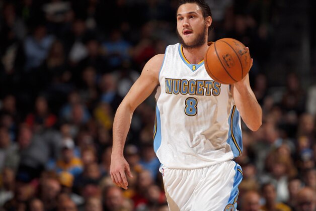 DENVER, CO - APRIL 08:  Danilo Gallinari #8 of the Denver Nuggets brings the ball upcourt against the Los Angeles Lakers at Pepsi Center on April 8, 2015 in Denver, Colorado. The Nuggets defeated the Lakers 119-101. NOTE TO USER: User expressly acknowledges and agrees that, by downloading and or using this photograph, User is consenting to the terms and conditions of the Getty Images License Agreement.  (Photo by Doug Pensinger/Getty Images)