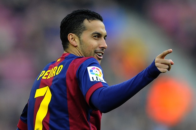 FC Barcelona's Pedro Rodriguez, gestures after scoring against Cordoba during a Spanish La Liga soccer match at the Camp Nou stadium in Barcelona, Spain, Saturday, Dec. 20, 2014. (AP Photo/Manu Fernandez)