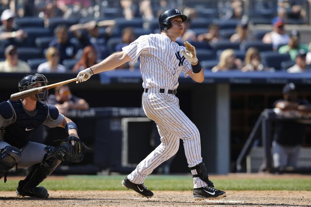New York Yankees Mark Teixeira watches his eighth-inning solo home run in a baseball game against the Seattle Mariners at Yankee Stadium in New York, Sunday, July 19, 2015.  (AP Photo/Kathy Willens)