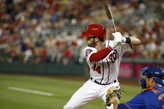 Washington Nationals right fielder Bryce Harper (34) bats during a baseball game against the New York Mets at Nationals Park, Monday, July 20, 2015, in Washington. The Nationals won 7-2. (AP Photo/Alex Brandon)