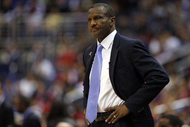 Toronto Raptors head coach Dwane Casey watches his team in the first half of Game 4 in the first round of the NBA basketball playoffs Washington Wizards, Sunday, April 26, 2015, in Washington. (AP Photo/Alex Brandon)