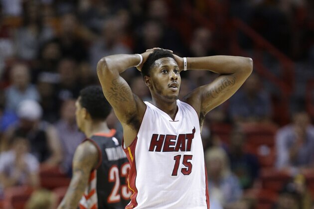 Miami Heat guard Mario Chalmers (15) reacts after a play during the first half of an NBA basketball game against the Toronto Raptors, Saturday, April 11, 2015, in Miami. (AP Photo/Wilfredo Lee)