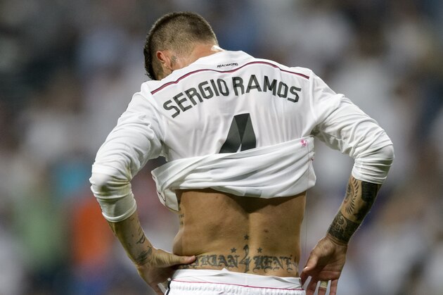 Real Madrid's defender Sergio Ramos stands at the end of the UEFA Champions League semifinal second leg football match Real Madrid FC vs Juventus at the Santiago Bernabeu stadium in Madrid on May 13, 2015.  AFP PHOTO / DANI POZO        (Photo credit should read DANI POZO/AFP/Getty Images)