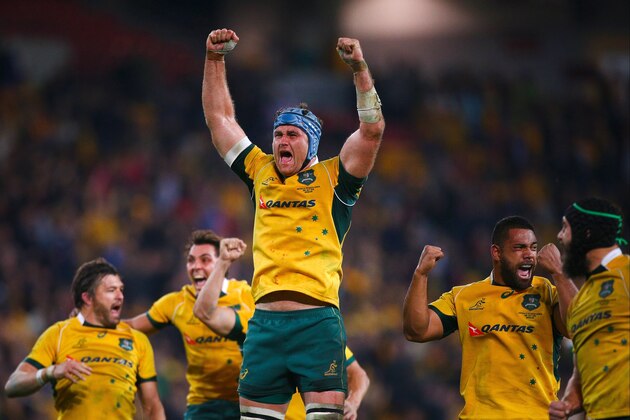 Australian rugby player James Horwill (C) celebrates victory after the Rugby Championship Test match between Australia and South Africa at Suncorp Stadium, Brisbane on July 18, 2015.  AFP PHOTO / PATRICK HAMILTON   ---IMAGE RESTRICTED TO EDITORIAL USE - STRICTLY NO COMMERCIAL USE---        (Photo credit should read PATRICK HAMILTON/AFP/Getty Images)