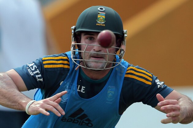 South African cricketer Dean Elgar catches a ball during a practice session ahead of their first test cricket match against Sri Lanka in Galle, Sri Lanka, Tuesday, July 15, 2014. (AP Photo/Eranga Jayawardena)