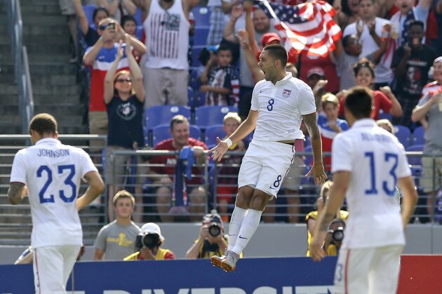 United States' Clint Dempsey (8) celebrates his goal against Cuba during the first half of a CONCACAF Gold Cup soccer quarterfinal match, Saturday, July 18, 2015, in Baltimore. (AP Photo/Patrick Semansky)