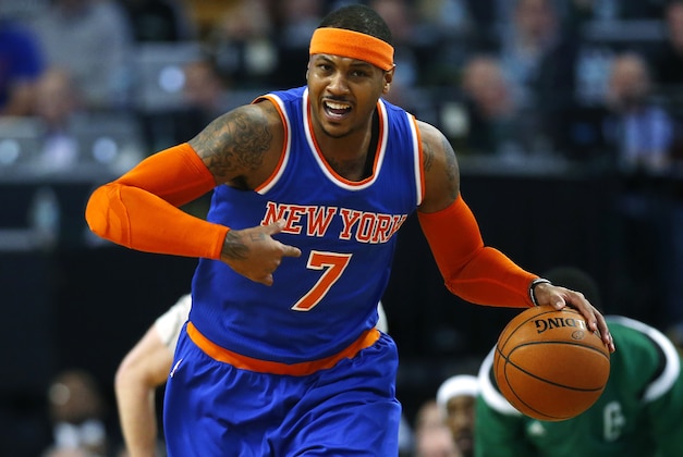 New York Knicks' Carmelo Anthony during the second half of the New York Knicks 101-95 win over the Boston Celtics in an NBA basketball game in Boston Friday, Dec. 12, 2014. (AP Photo/Winslow Townson)