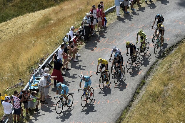 Italy's Vincenzo Nibali (2ndL) and Great Britain's Christopher Froome (3rdL), wearing the overall leader's yellow jersey, ride ahead of Colombia's Nairo Quintana (5thL), wearing the best young's white jersey, Spain's Alejandro Valverde (4thL) and Spain's Alberto Contador (3rdR) during the 161 km seventeenth stage of the 102nd edition of the Tour de France cycling race on July 22, 2015, between Digne-les-Bains and Pra Loup, southeastern France. AFP PHOTO / LIONEL BONAVENTURE        (Photo credit should read LIONEL BONAVENTURE/AFP/Getty Images)