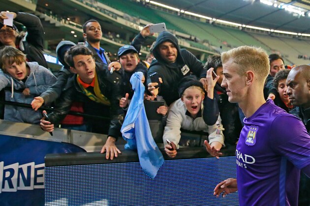 MELBOURNE, AUSTRALIA - JULY 21:  Manchester City fans show their support as Manchester City goalkeeper Joe Hart leaves the field after the International Champions Cup match between Manchester City and AS Roma at the Melbourne Cricket Ground on July 21, 2015 in Melbourne, Australia.  (Photo by Scott Barbour/Getty Images)