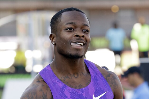 Buffalo Bills wide receiver Marquise Goodwin playfully sticks his tongue out after his attempt in the long jump at the U.S. track and field championships in Eugene, Ore., Thursday, June 25, 2015. Goodwin is taking a break from football to return to the long jump. (AP Photo/Don Ryan)