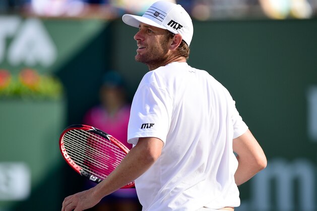INDIAN WELLS, CA - MARCH 12:  Mardy Fish reacts to his overhead to win a point in his match against Ryan Harrison during the BNP Parisbas Open at the Indian Wells Tennis Garden on March 12, 2015 in Indian Wells, California.  (Photo by Harry How/Getty Images)