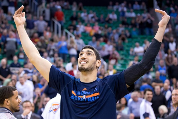 Mar 28, 2015; Salt Lake City, UT, USA; Oklahoma City Thunder center Enes Kanter (34) reacts to being booed by Utah Jazz fans during his introduction prior to the game at EnergySolutions Arena. The Jazz won 94-89. Mandatory Credit: Russ Isabella-USA TODAY Sports