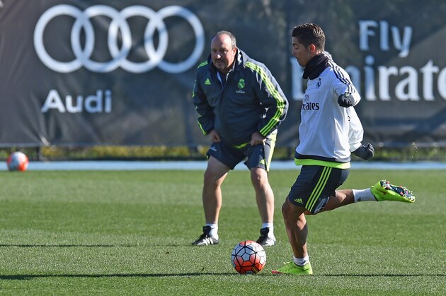 Real Madrid's coach Rafa Benitez (L) watches forward Cristiano Ronaldo (R) during a team training session during the International Champions Cup tournament in Melbourne on July 20, 2015. AFP PHOTO / Paul CROCK -- IMAGE RESTRICTED TO EDITORIAL USE - STRICTLY NO COMMERCIAL USE        (Photo credit should read PAUL CROCK/AFP/Getty Images)
