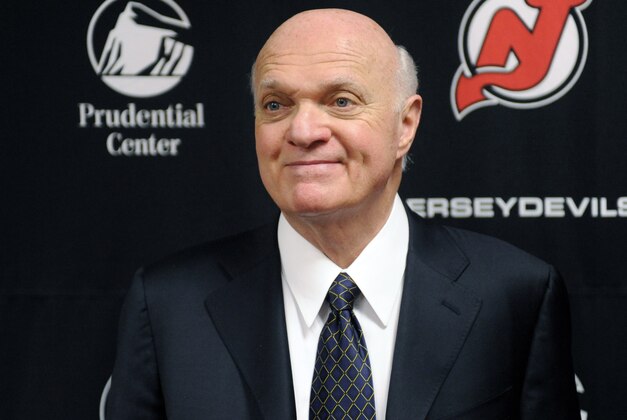 New Jersey Devils general manager Lou Lamoriello talks to the media as the NHL hockey team clean out their lockers Monday, April 14, 2014, in Newark, N.J. (AP Photo/Bill Kostroun)