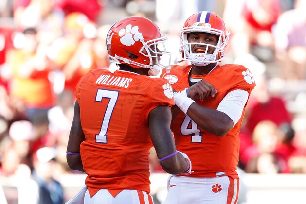 CLEMSON, SC - OCTOBER 4: Deshaun Watson #4 of the Clemson Tigers celebrates with Mike Williams #7 after scoring a touchdown during the game against the North Carolina State Wolfpack at Memorial Stadium on October 4, 2014 in Clemson, South Carolina. (Photo by Tyler Smith/Getty Images) CLEMSON, SC - OCTOBER 4: Deshaun Watson #4 of the Clemson Tigers celebrates with Mike Williams #7 after scoring a touchdown during the game against the North Carolina State Wolfpack at Memorial Stadium on October 4, 2014 in Clemson, South Carolina. (Photo by Tyler Smith/Getty Images)