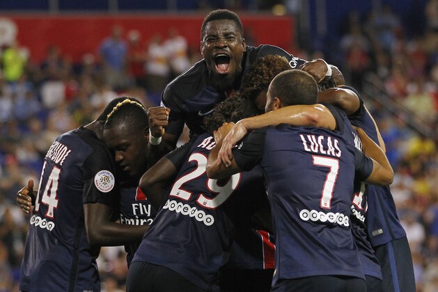 Paris Saint-Germain midfielder Blaise Matuidi (14), forward Hervin Ongenda, second from left, midfielder Lucas (7), and defender Serge Aurier, top, celebrate a goal by forward Jean-Kevin Augustin (29) against Fiorentina in the first half during a soccer match in the International Champions Cup in Harrison N.J., Tuesday, July 21, 2015. Paris Saint-Germain won 4-2. (AP Photo/Rich Schultz) Paris Saint-Germain midfielder Blaise Matuidi (14), forward Hervin Ongenda, second from left, midfielder Lucas (7), and defender Serge Aurier, top, celebrate a goal by forward Jean-Kevin Augustin (29) against Fiorentina in the first half during a soccer match in the International Champions Cup in Harrison N.J., Tuesday, July 21, 2015. Paris Saint-Germain won 4-2. (AP Photo/Rich Schultz)