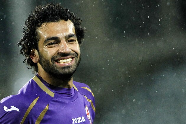 Fiorentina's Mohamed Salah Ghaly, left, celebrates after scoring during a Serie A soccer match between Fiorentina and Sampdoria   at the Artemio Franchi stadium in Florence, Italy  Saturday, April 4, 2015. (AP Photo/Fabrizio Giovannozzi)