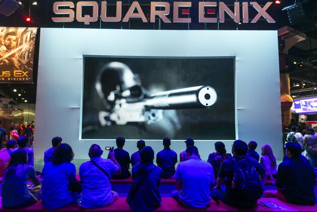 Attendees watch a Square Enix