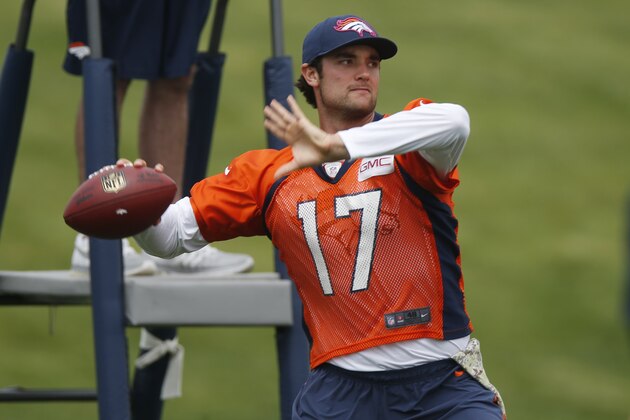 Denver Broncos quarterback Brock Osweiler passes during an NFL football minicamp at the team's headquarters Thursday, June 11, 2015, in Englewood, Colo. (AP Photo/David Zalubowski)
