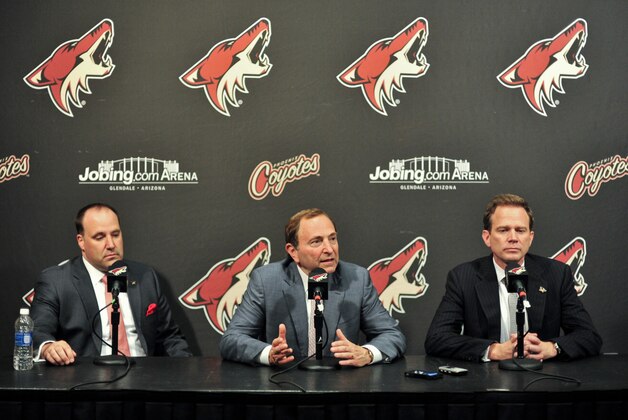 Oct 3, 2013; Glendale, AZ, USA; (left to right)  Phoenix Coyotes alternate governor Anthony LeBlanc  NHL commisioner Gary Bettman and governor George Gosbee during a press conference prior to the game against the New York Rangers  at Jobing.com Arena. Mandatory Credit: Matt Kartozian-USA TODAY Sports