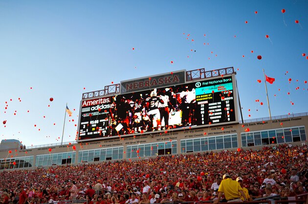 LINCOLN, NE - AUGUST 31: Nebraska fans release red balloons after the Nebraska Cornhuskers score their first points of the game against the Wyoming Cowboys at Memorial Stadium on August 31, 2013 in Lincoln, Nebraska.  (Photo by Eric Francis/Getty Images)