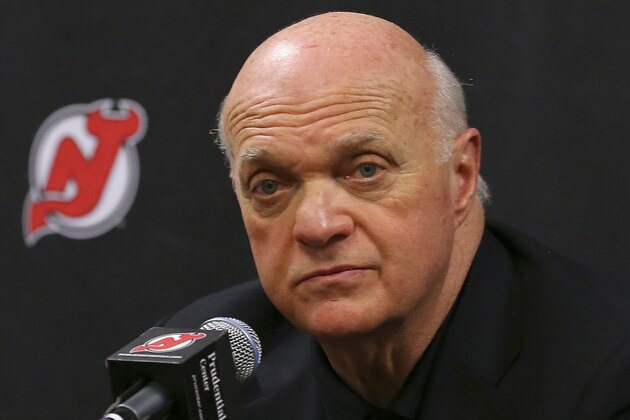 New Jersey Devils president and general manager Lou Lamoriello makes an announcement regarding the team's head coach during an NHL hockey news conference on Saturday, Dec. 27, 2014, in Newark, N.J. Devils are replacing the fired Pete DeBoer with a three-headed coaching staff. Former Washington Capitals coach Adam Oates, ex-Devils assistant and star defenseman Scott Stevens and Lamoriello will split duties on the bench. (AP Photo/Adam Hunger)