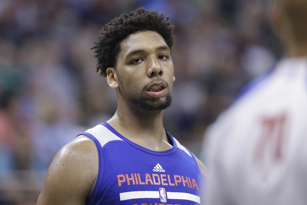 Philadelphia 76ers Jahlil Okafor looks on during the first half of an NBA summer league basketball game against the San Antonio Spurs Monday, July 6, 2015, in Salt Lake City.  (AP Photo/Rick Bowmer)