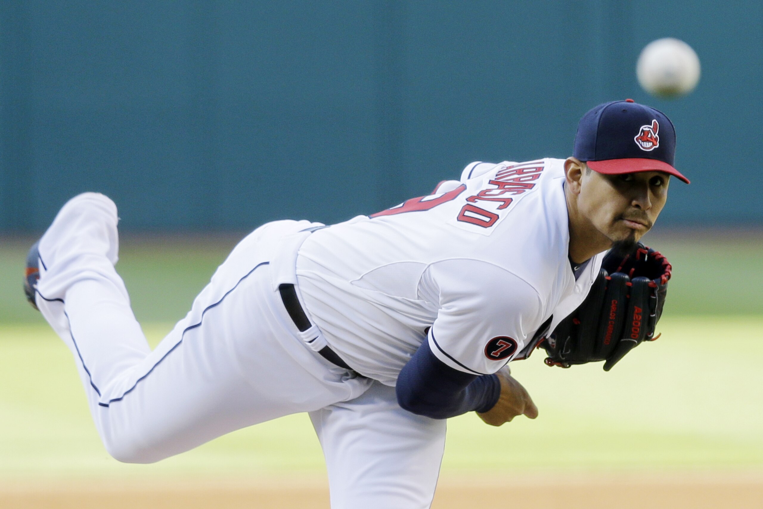Cleveland Indians starting pitcher Carlos Carrasco delivers in the first inning of a baseball game against the Cincinnati Reds, Friday, May 22, 2015, in Cleveland. (AP Photo/Tony Dejak)