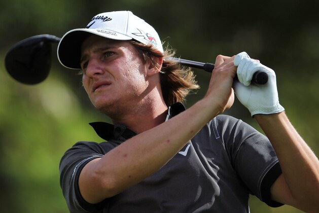 Argentina’s Emiliano Grillo watches his shot on the 15th tee during the final round of the Puerto Rico Open PGA golf tournament in Rio Grande, Puerto Rico, Sunday, March 8, 2015. (AP Photo/Ricardo Arduengo)