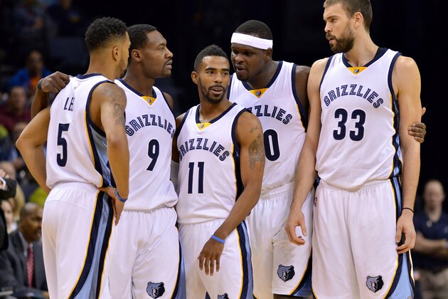 Memphis Grizzlies players Courtney Lee (5), Tony Allen (9), Mike Conley (11) Zach Randolph, second from left, and Marc Gasol (33) talk during a break in the first half of an NBA basketball game Tuesday, Dec. 9, 2014, in Memphis, Tenn. (AP Photo/Brandon Dill)