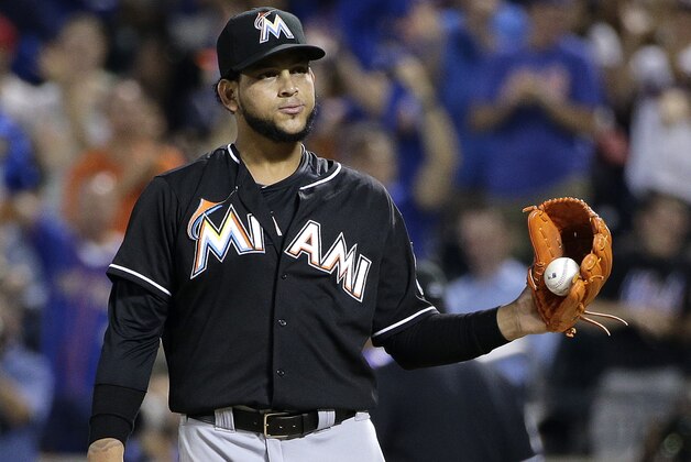 Miami Marlins pitcher Henderson Alvarez reacts after giving up a two-run home run to New York Mets' David Wright in the fifth inning of a baseball game, Friday, July 11, 2014, in New York. (AP Photo/Julie Jacobson)