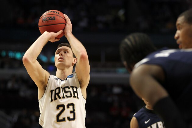 CHICAGO, IL - MARCH 18: Ben Hansbrough #23 of the Notre Dame Fighting Irish shoots a foul shot as the Akron Zips look on in the first half during the second round of the 2011 NCAA men's basketball tournament at the United Center on March 18, 2011 in Chicago, Illinois.  Notre Dame won 69-56.  (Photo by Jamie Squire/Getty Images)