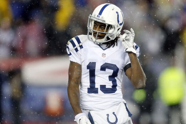 Indianapolis Colts wide receiver T.Y. Hilton walks off the field after an interception by the New England Patriots during the second half of the NFL football AFC Championship game Sunday, Jan. 18, 2015, in Foxborough, Mass. (AP Photo/Julio Cortez)
