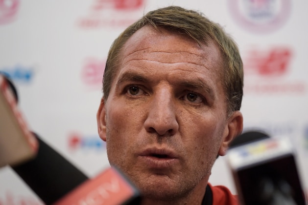 Liverpool's Northern Irish manager Brendan Rodgers answers questions during a press conference in Kuala Lumpur on July 22, 2015 ahead of their friendly match against Malaysia XI. Liverpool will play an exhibition match against a Malaysia XI team at the Bukit Jalil Stadium on July 24.  AFP PHOTO / MANAN VATSYAYANA        (Photo credit should read MANAN VATSYAYANA/AFP/Getty Images)