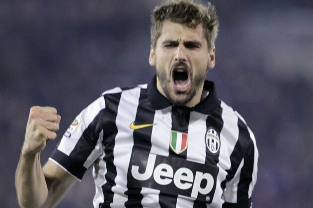 Juventus' Fernando Llorente celebrates after scoring during an Italian Serie A soccer match between Cagliari and Juventus, at the Sant' Elia stadium in Cagliari, Italy, Thursday, Dec. 18, 2014. (AP Photo/Daniela Santoni)