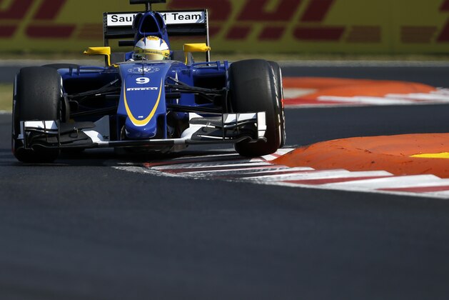 Sauber driver Marcus Ericsson from Sweden steers his car during the free practice at the Hungarian Formula One Grand Prix in Budapest, Hungary, Friday, July 24, 2015. The Hungarian Formula One Grand Prix will be held on Sunday July, 26. (AP Photo/Darko Vojinovic)