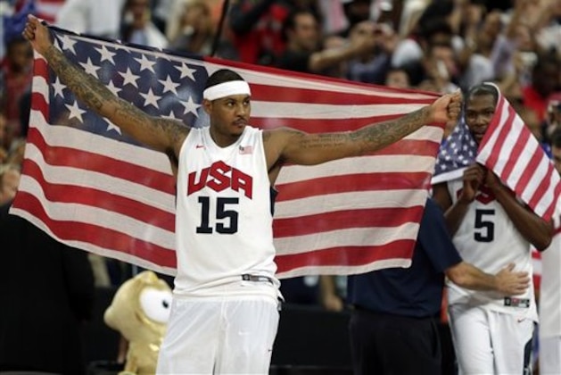 United States' Carmelo Anthony celebrates after the men's gold medal basketball game at the 2012 Summer Olympics, Sunday, Aug. 12, 2012, in London. USA won 107-100. (AP Photo/Charles Krupa)