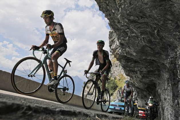 Laurens ten Dam of the Netherlands climbs with other rider during the nineteenth stage of the Tour de France cycling race over 138 kilometers (85.7 miles) with start in Saint-Jean-de-Maurienne and finish in La Toussuire, France, Friday, July 24, 2015. (AP Photo/Laurent Cipriani) Laurens ten Dam of the Netherlands climbs with other rider during the nineteenth stage of the Tour de France cycling race over 138 kilometers (85.7 miles) with start in Saint-Jean-de-Maurienne and finish in La Toussuire, France, Friday, July 24, 2015. (AP Photo/Laurent Cipriani)