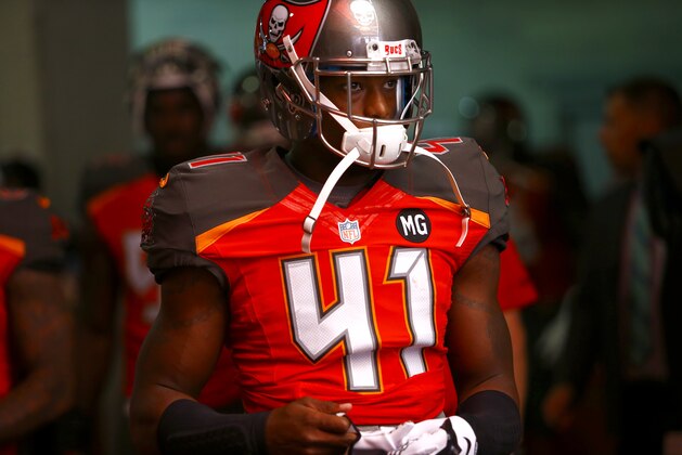 Tampa Bay Buccaneers defensive back C.J. Wilson (41) waits to walk out of the tunnel at the start of an NFL football game against the New Orleans Saints on Sunday, Dec. 28, 2014, in Tampa, Fla. (AP Photo/Brian Blanco)