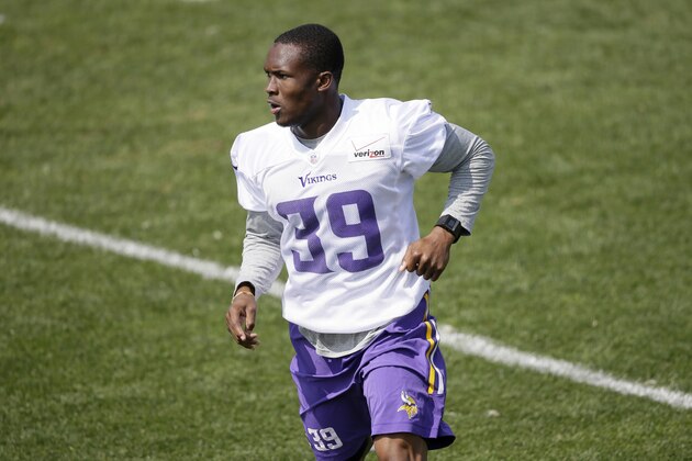 Minnesota Vikings cornerback Jabari Price runs on the field during an NFL football training camp practice, Saturday, Aug. 2, 2014, in Mankato, Minn. (AP Photo/Charlie Neibergall)
