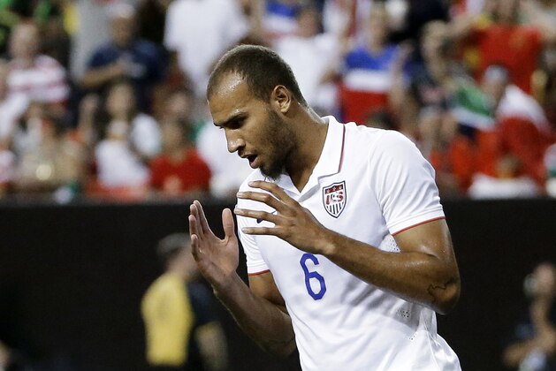 United States’ John Brooks reacts after missing a scoring opportunity during the second half of a CONCACAF Gold Cup soccer semifinal against Jamaica on Wednesday, July 22, 2015, in Atlanta. Jamaica won 2-1. (AP Photo/David Goldman)
