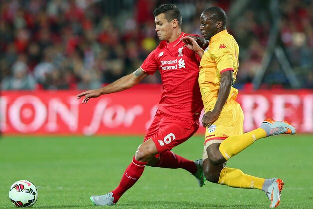 ADELAIDE, AUSTRALIA - JULY 20: Dejan Lovren of Liverpool FC and Bruce Djite of United compete for the ball during the international friendly match between Adelaide United and Liverpool FC at Adelaide Oval on July 20, 2015 in Adelaide, Australia. (Photo by Quinn Rooney/Getty Images) ADELAIDE, AUSTRALIA - JULY 20: Dejan Lovren of Liverpool FC and Bruce Djite of United compete for the ball during the international friendly match between Adelaide United and Liverpool FC at Adelaide Oval on July 20, 2015 in Adelaide, Australia. (Photo by Quinn Rooney/Getty Images)