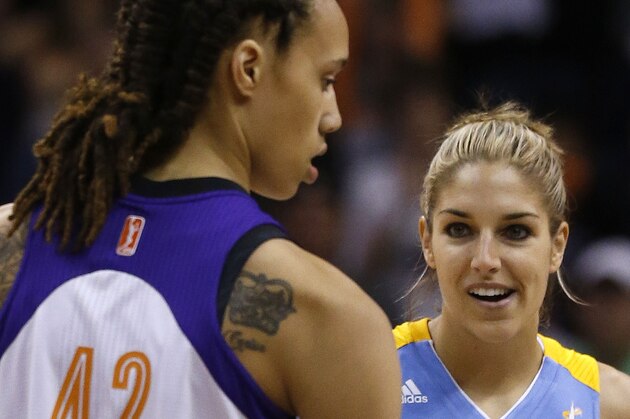 Chicago Sky's Elena Delle Donne, right, smiles as she looks at Phoenix Mercury's Brittney Griner (42) at the start of the first half during a WNBA basketball game on Monday, May 27, 2013, in Phoenix. (AP Photo/Ross D. Franklin)