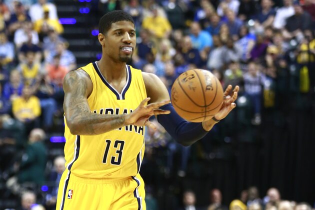Indiana Pacers forward Paul George passes the ball against the Miami Heat in the second half of an NBA basketball game, Sunday, April 5, 2015, in Indianapolis. Indiana won 112-89. (AP Photo/R Brent Smith)