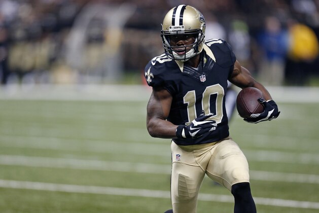 New Orleans Saints wide receiver Brandin Cooks (10) carries on a pass play in the first half of an NFL football game against the Cincinnati Bengals in New Orleans, Sunday, Nov. 16, 2014. (AP Photo/Rogelio Solis)