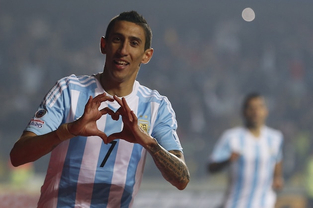 Argentina's Angel Di Maria celebrates after scoring his team;'s third goal during a Copa America semifinal soccer match against Paraguay at the Ester Roa Rebolledo Stadium in Concepcion, Chile, Tuesday, June 30, 2015. (AP Photo/Silvia Izquierdo)