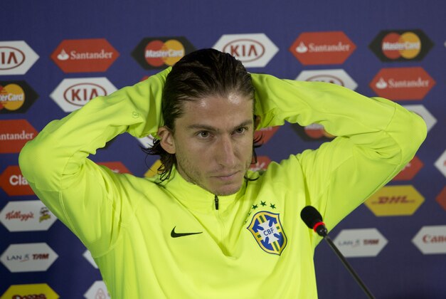 Brazil's soccer player Filipe Luis listens to a question during a press conference in Concepcion, Chile, Friday, June 26, 2015. Brazil will face Paraguay in a Copa America soccer match Saturday. (AP Photo/Silvia Izquierdo)
