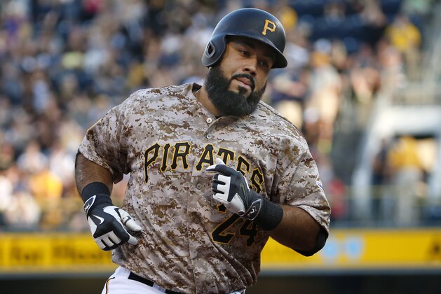Pittsburgh Pirates' Pedro Alvarez rounds third after hitting a solo-home run off Washington Nationals starting pitcher Doug Fister in the second inning of a baseball game in Pittsburgh, Thursday, July 23, 2015. (AP Photo/Gene J. Puskar)